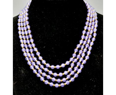 A Four-Strand Jade Small Bead Necklace. Gilded spacers and clasp. 44cm 