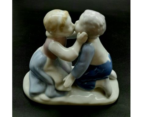 A sweet vintage ceramic figurine by Gerold Porcelain, stamped for West Germany depicting two young lovers. stands 11cm in hei