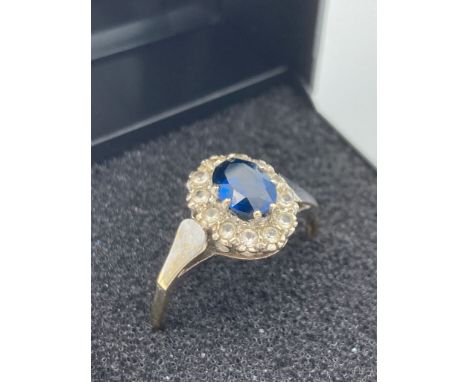 9 carat GOLD, TANZANITE and WHITE TOPAZ RING,Having oval cut Tanzanite set to top with White Topaz surround. Full UK hallmark