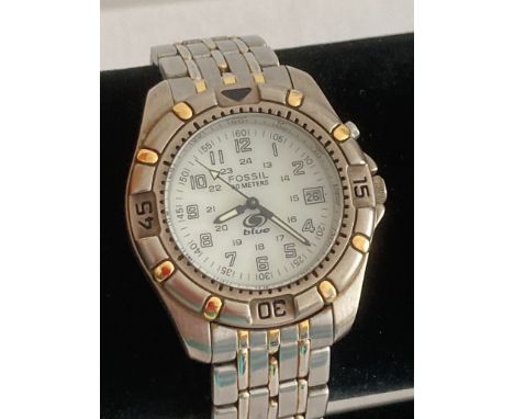 Gentlemans FOSSIL silver tone Quartz Wristwatch, Diver?s ?blue? model, having chronograph bezel, White face with luminous han