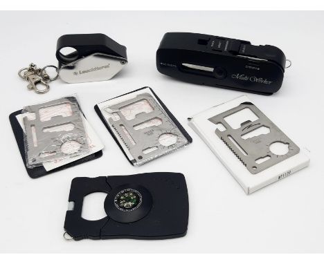 A Collection of Six Utility Tools Comprising of 3 Wallet Survival Tools, One Compass and Magnifier Survival Tool, Belt Clip M