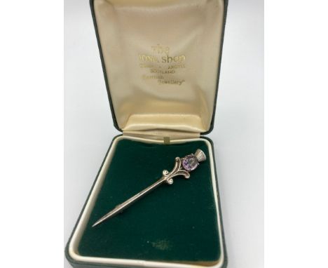 Large Vintage SCOTTISH SILVER  sword brooch having Amethyst Quartz and thistle hilt.Complete with original Scottish brooch bo