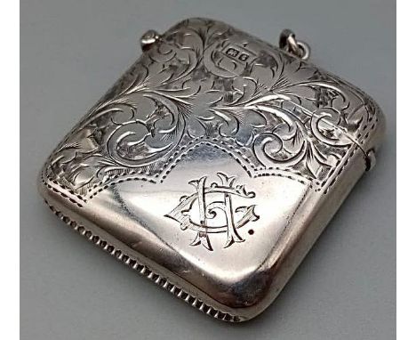 An Antique Engraved Silver Vesta Case. Hallmarks for Chester 1905. Makers mark of J and R Griffin. 4.5 x 4.5cm. 30.90g 