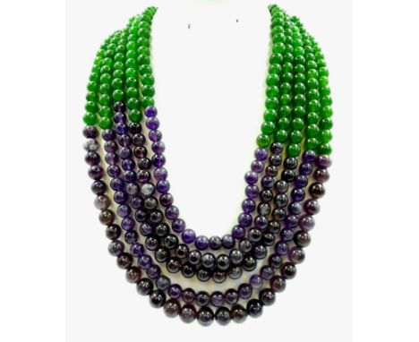 A 1050ct Green and Purple Haze of Jade and Amethysts in a Five-Strand Necklace. 8mm beads. 46-50cm. 