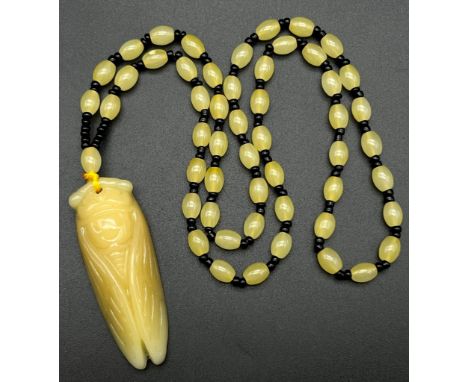 Chinese Jade carved lucky beads necklace with a a Grasshopper pendant. 39.5cm in length 