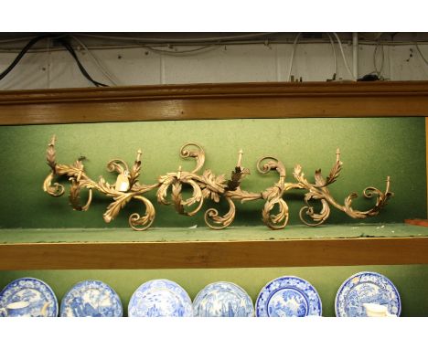 A decorative naturalistic shaped ormolu eight branch light fitting.