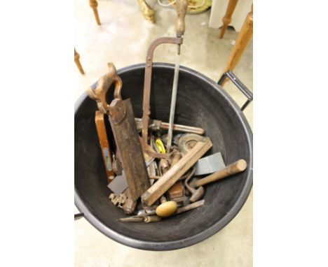A bucket of old tools.