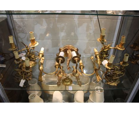 A collection of ormolu light fittings.