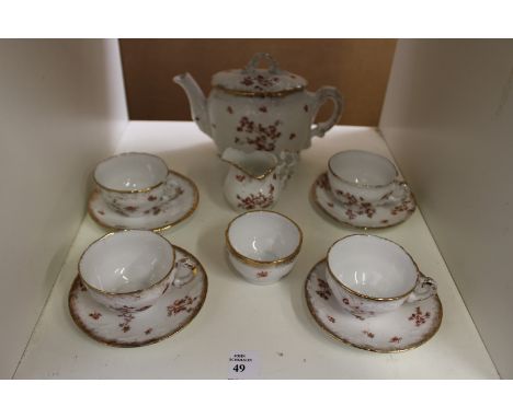 A child's porcelain tea service.