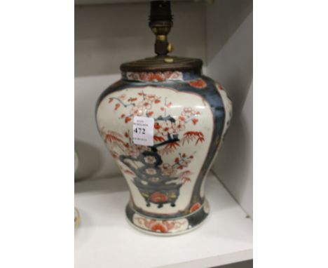 A Japanese Imari baluster shaped vase converted to a lamp.