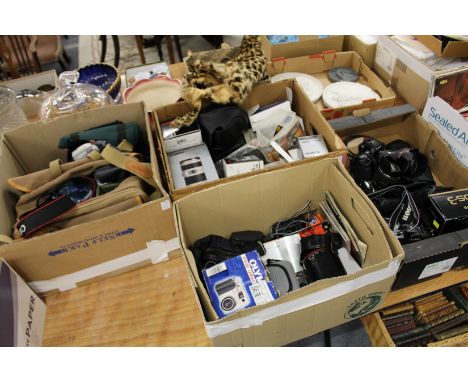 A good large collection of camera and camera equipment to include Canon EOS-3, EOS-33, EOS-620, with numerous accessories.