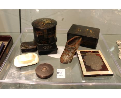 A tortoiseshell and mother-of-pearl calling card case with inlaid decoration, a shoe shaped snuff box (lacking lid) and other