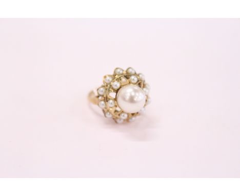 A 14ct gold and pearl dress ring.