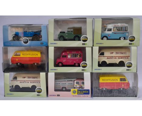 Oxford Diecast a boxed group to include AHT004 Austin Heavy Twelve Kingfisher (Blue), LAN180001E Series 1 Land Rover 80 Inch 