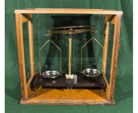 A pair of vintage scientific brass weigh scales in glass case, Griffin & George Ltd