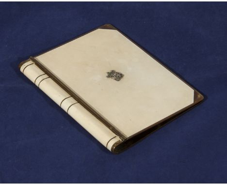 An Art Deco ivory and enamel note book cover with diamond and emerald turtle to front