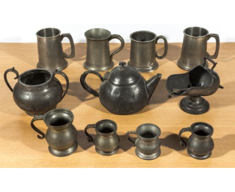 A collection of pewter tankards, measures, teapot and two sugars