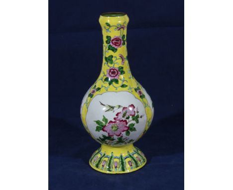 A Canton enamel yellow ground vase, 25cm tall