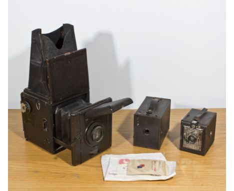Vintage 'Ensign Popular Reflex' camera together with a Lumiere box camera and a Kodak No2 Box Brownie