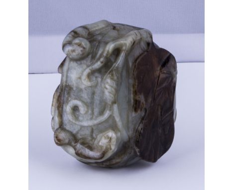 A Chinese jade snuff bottle carved with a squirrel amongst leaves design. 5.5cm x 5cm
