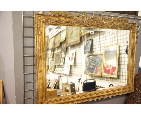 Carved gilt framed bevelled edged mirror, 108 x 80 cm. Not available for in-house P&amp;P 