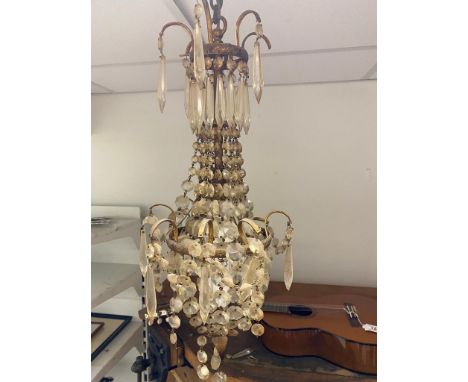 A pair of antique crystal light fittings