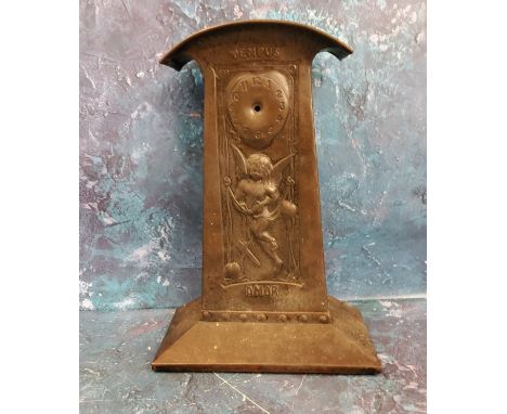 An Art Nouveau pewter mantel clock, in the Liberty manner, embossed with Cupid inscribed Tempus Amor, 26.5cm high, c.1910 