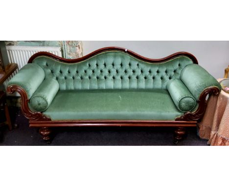 A Victorian mahogany lyre-arm sofa, serpentine back, stuffed-over upholstery, turned legs, castors, 210cm wide x 94cm high x 