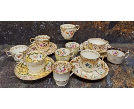 A Minton cup, saucer and side plate, pattern 676, decorated with colourful summer flowers within a gilt cartouche, on a yello