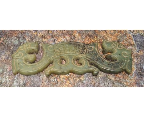 A Chinese jade archaic carving, 10.5cm wide 
