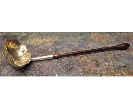 An early 19th century silver toddy ladle, turned handle, 31cm long, c.1810 