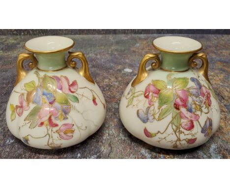 A pair of Royal Worcester lobed ovoid two&nbsp; handled vases,&nbsp; painted with flowers in prismatic enamels, picked out in