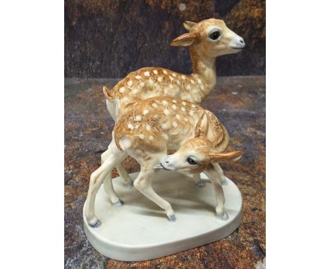 A Royal Worcester pre-production model of Fawns,&nbsp; by Doris Lindner, oval base, 12cm high,&nbsp; c. 1950 