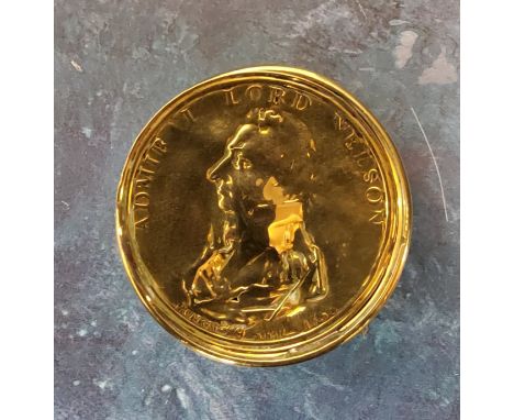 Naval History - a 19th century gilt brass medallic snuff box, the cover embossed bust of Admiral Lord Nelson, the sides with 