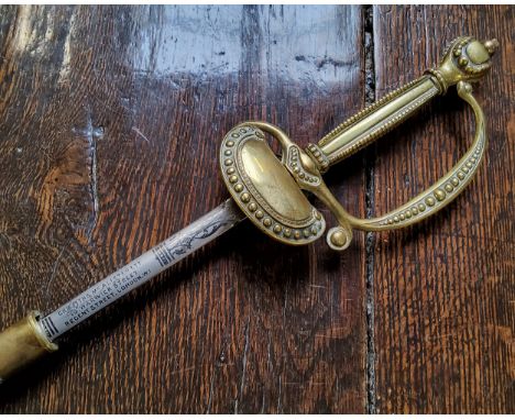 A 20th century dress sword, with gilt metal grip, the 81.5cm long blade etched Griffiths, Mcalister, Ltd, &nbsp;10 Warwick St