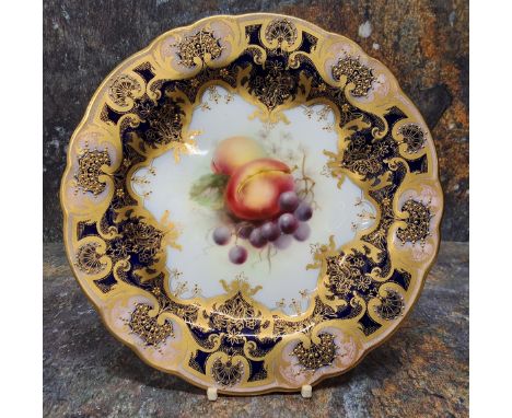 A Royal Worcester shaped circular plate,&nbsp; painted by F. Martin, signed,&nbsp;with ripe peaches and blackberries, within 