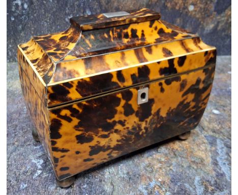 An early Victorian tortoiseshell bowed rectangular tea caddy, hinged pagoda top, two lidded compartments, bun feet, 18.5cm wi