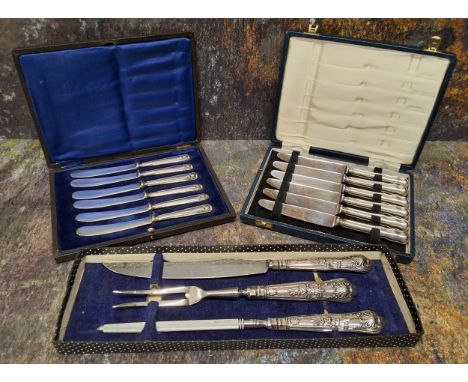 A silver three piece Kings pattern carving set, Sheffield 1971, boxed;&nbsp; a set of six silver hafted dessert knives, Sheff