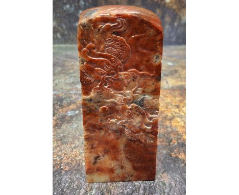 A Chinese hardstone seal, carved scrolling dragons, 9.5cm high 