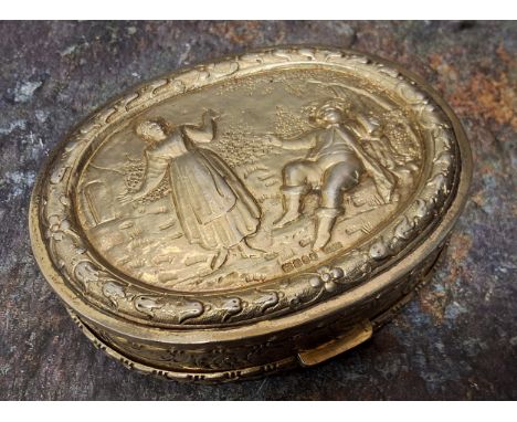 A good Dutch silver oval table snuff box, the cover embossed with figures at a table, harebell border, the sides with scrolls