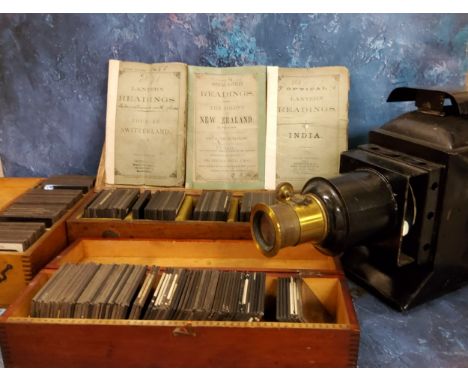 An early 20th century magic lantern projector, 29cm high, 43cm long, c.1910;&nbsp; Magic Lantern Slides - mostly Topographica