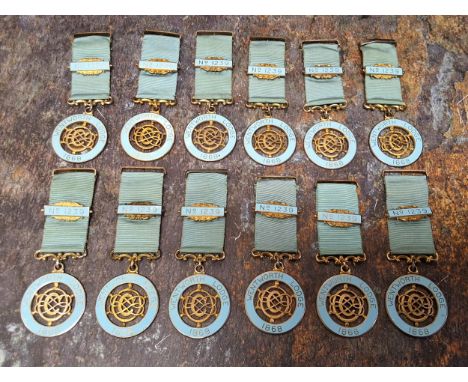 Twelve silver gilt and turquoise enamel&nbsp; Masonic Centenary Jewels,&nbsp; Wentworth Lodge 1868, Birmingham 1968 