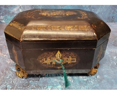 An early 19th century Chinese black lacquered tea caddy,&nbsp; decorated in gilt with pagodas and figures, two paktong canist
