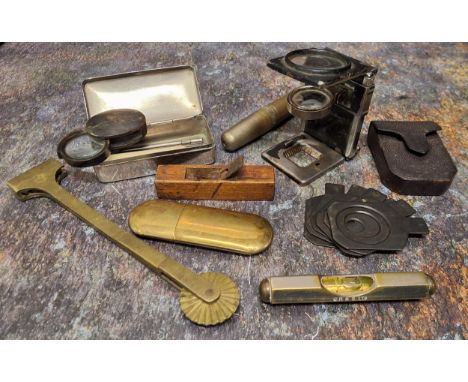 Tools -a miniature plane, 6.5cm long; a level; lens; etc 