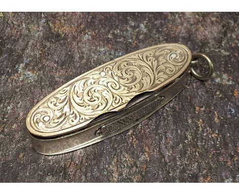 A silver plate cigar smokers vesta/pen knife case, with oval box for matches, knife blade, two prong fork for cigar stub, dec