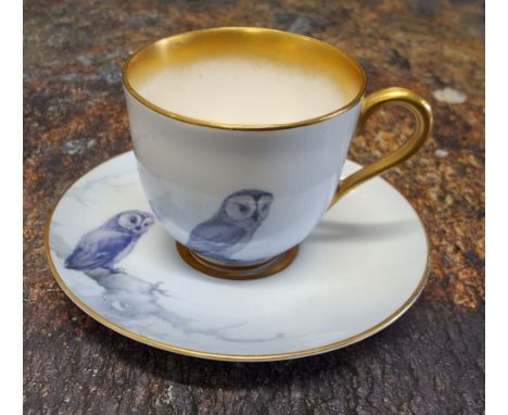 A Royal Worcester demi-tasse cup and saucer,&nbsp; painted in the&nbsp; style of Raymond Rushton, with owls, in tones of blue