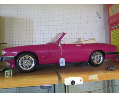 A Large Scale Pink Barbie Jaguar XJS 