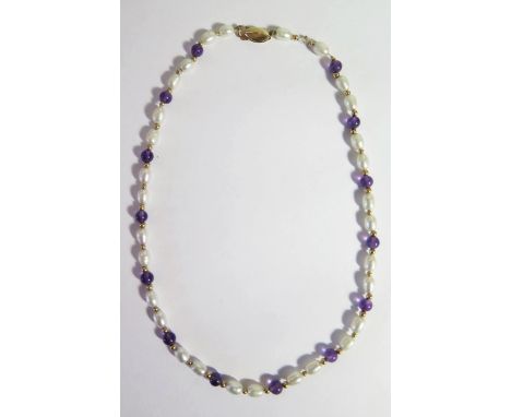 A Pearl and Amethyst Necklace with 14K gold clasp, 37cm, 9.5g 