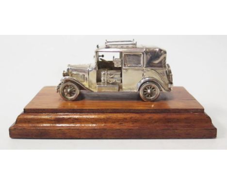 A Modern Silver Model of an Old London Taxi, base 13cm long, London 1996, R&amp;H 