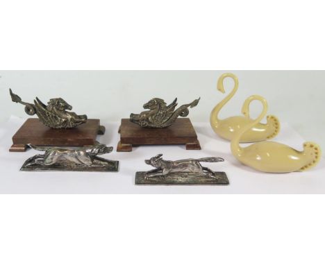 A Pair of Electroplated Silver Knife Rests in the form of running hounds William Hutton &amp; Sons, pair of white metal Hippo